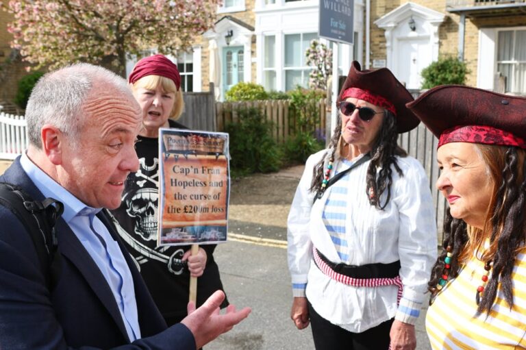 PROTESTERS CHANT ‘ROBBING OUR ISLAND’ AS TRANSPORT MINISTER MEETS FERRY BOSSES